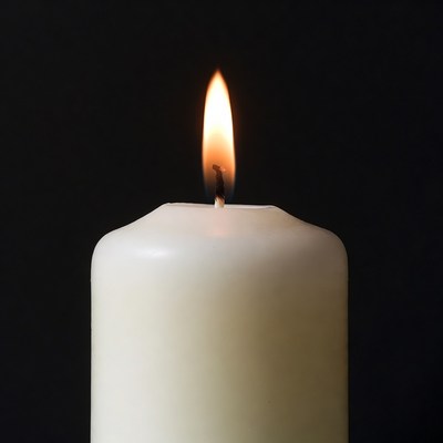 White Candle Burning Flame