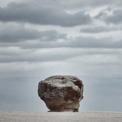 Large Boulder on Sandy Desert