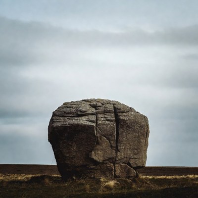Large Boulder on Grassy Hill