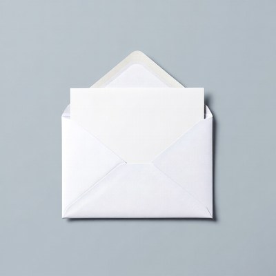 Open white envelope with blank card