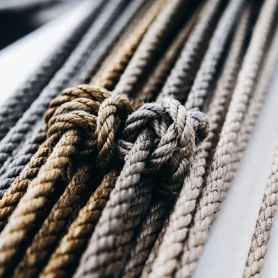 Coiled ropes with knots