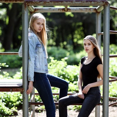 Two blonde girls at playground