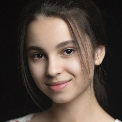 Smiling young woman with dark hair