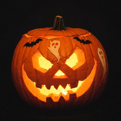 Lit Jack-o-Lantern with Ghosts