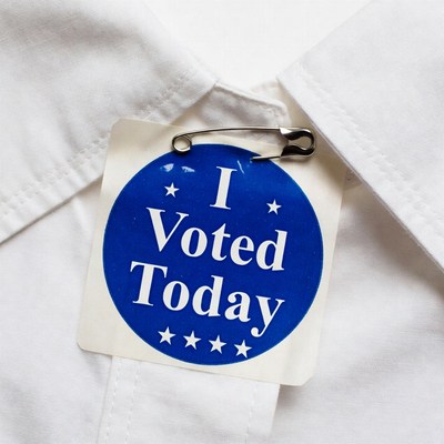 I Voted Today badge on white shirt