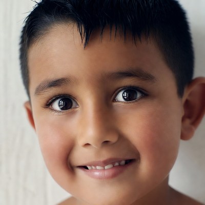 Smiling Asian boy close-up