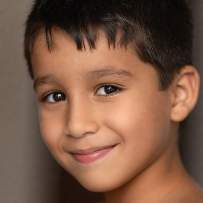 Smiling Asian boy close-up
