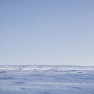 Snowy Landscape Under Blue Sky