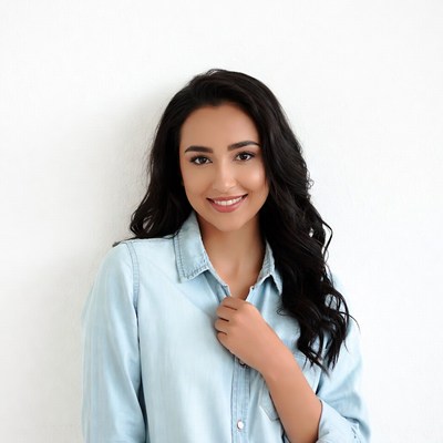 Smiling woman in blue shirt