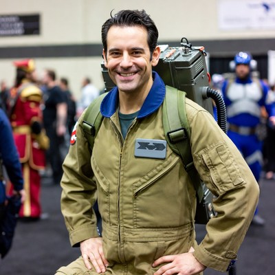 Man in Ghostbusters jumpsuit cosplay