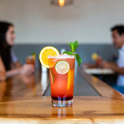 Orange Mint Cocktail on Bar Counter