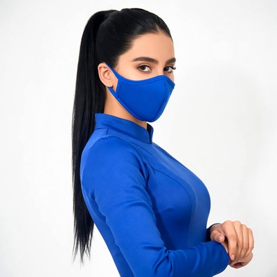 Woman in blue face mask and dress