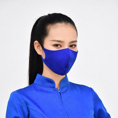 Asian woman wearing blue face mask