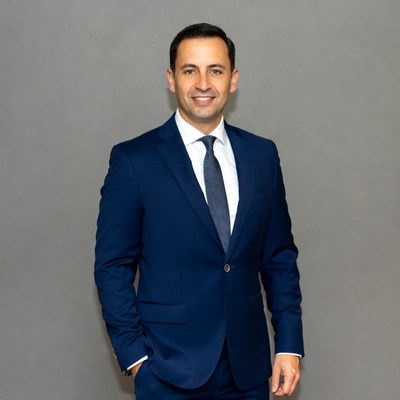 Smiling man in navy suit