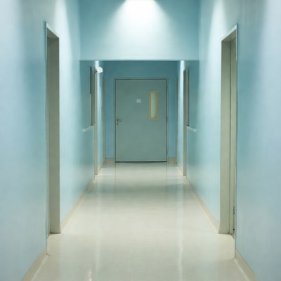 Empty Blue Hospital Corridor