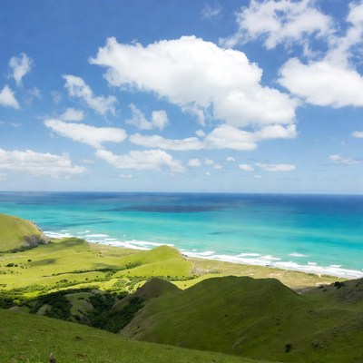 Green Hills Overlooking Turquoise Ocean Beach