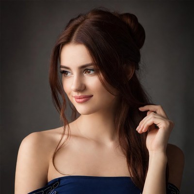 Beautiful woman with brown updo hairstyle