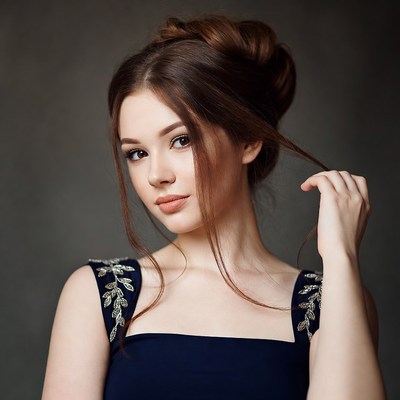 Woman with brown updo hairstyle