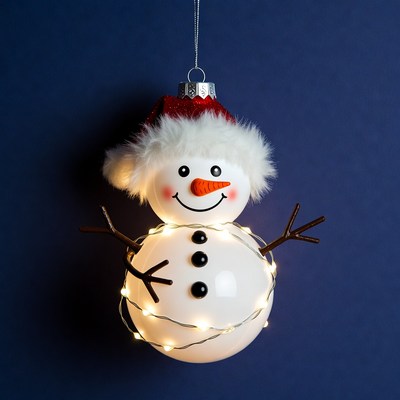 Lit Snowman Ornament Hanging Blue Background