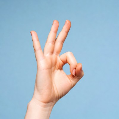 Hand making OK sign