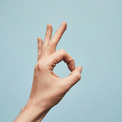 Hand making OK sign