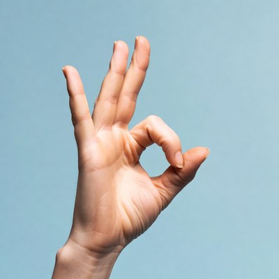 Hand making OK sign