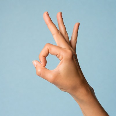 Hand making OK sign