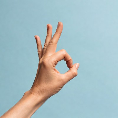 Hand making OK sign