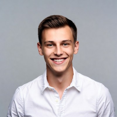 Smiling young man in white shirt