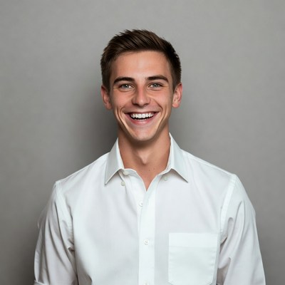 Smiling young man in white shirt
