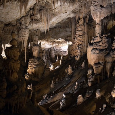 Stalactites in illuminated cave