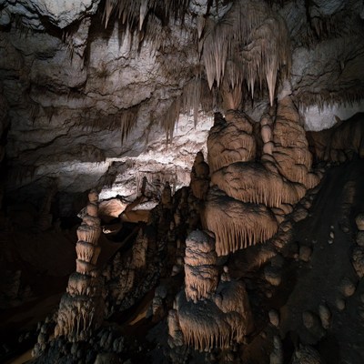 Stalactites in illuminated cave
