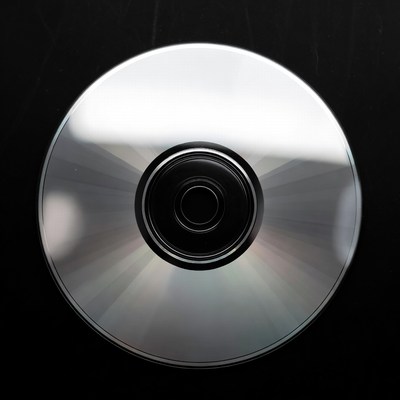 Shiny CD Disc on Black Background