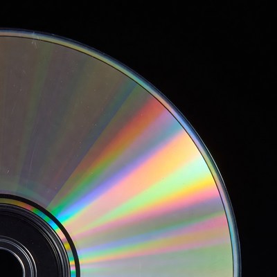 Shiny CD Disc on Black Background