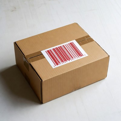 Cardboard box with red barcode