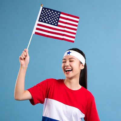 Asian girl holding American flag