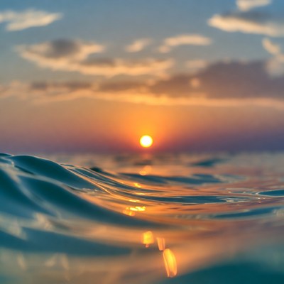 Sunset over ocean waves