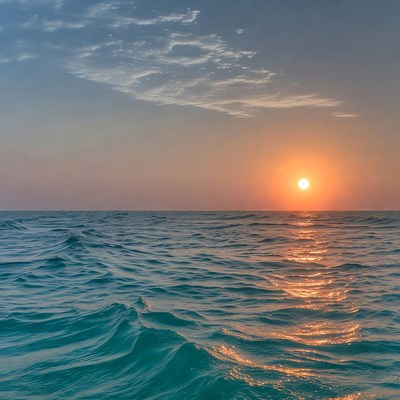 Sunset over ocean waves