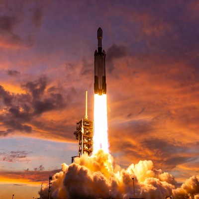 Falcon 9 Rocket Launching at Sunset