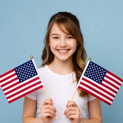 Girl holding American flags