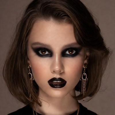 Woman with dramatic black makeup
