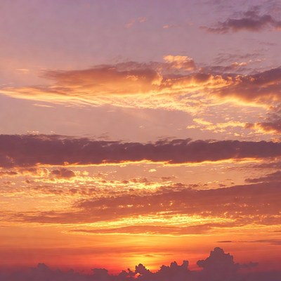 Vibrant Sunset Over Clouds