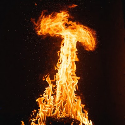 Fiery Cross-Shaped Flame Burst