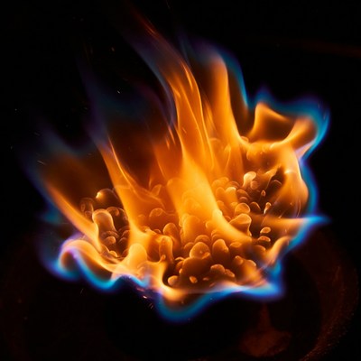 Vibrant orange blue flames on black