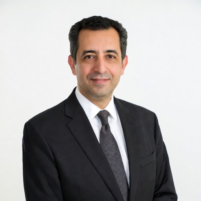 Middle Eastern man in black suit