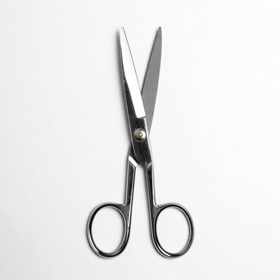Silver Scissors on White Background