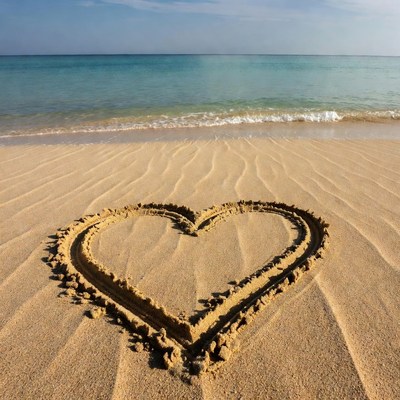 Heart drawn in beach sand