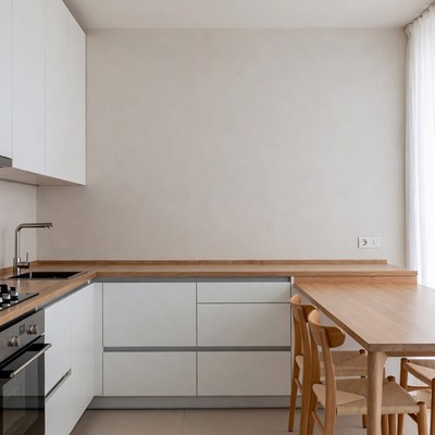 Modern White Kitchen with Wooden Dining Table