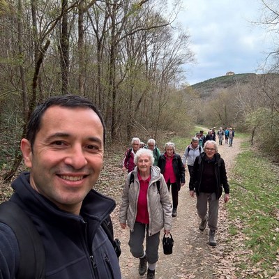 Man Selfie with Seniors Hiking Forest Trail