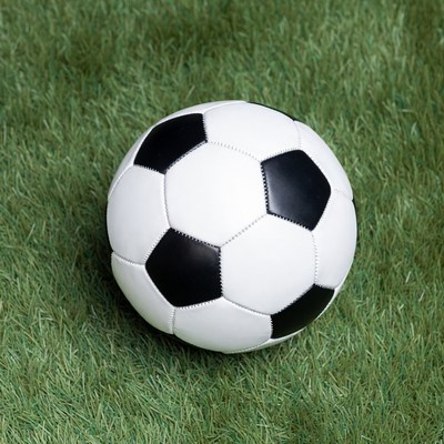 Soccer ball on green grass